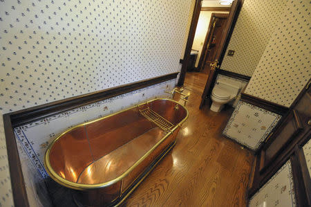 A copper bathtub is pictured in the main house inside Michael Jackson's Neverland Ranch in Los Olivos, California July 3, 2009. REUTERS/Phil Klein/Files