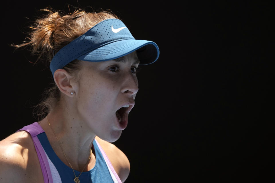 Belinda Bencic of Switzerland reacts during her third round match against Camila Giorgi of Italy at the Australian Open tennis championship in Melbourne, Australia, Saturday, Jan. 21, 2023. (AP Photo/Aaron Favila)