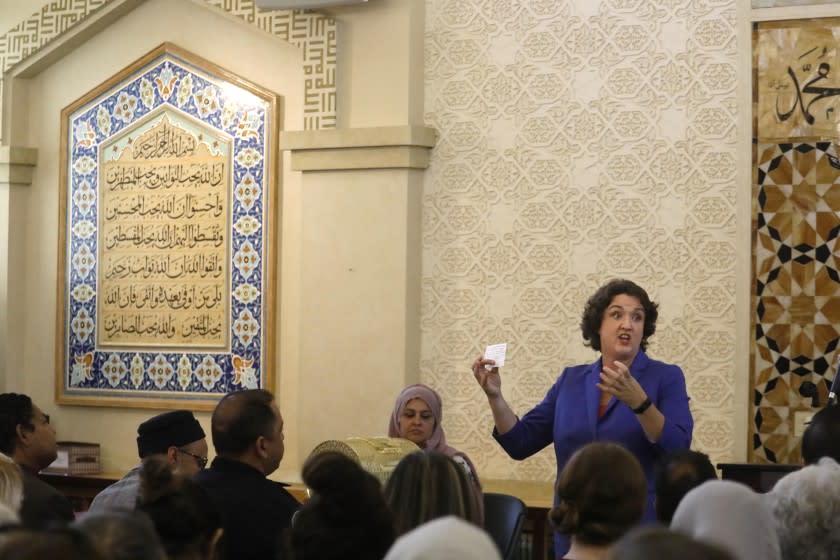 IRVINE, CA - AUGUST 24, 2019 - - Rep. Katie Porter holds a town hall meeting answering questions from constituents about impeachment of the president, global warming and immigration at the Islamic Center of Irvine in Irvine on August 24, 2019. Porter spent the day criss-crossing her districts to make her case for re-election in a tough swing district.(Genaro Molina / Los Angeles Times)