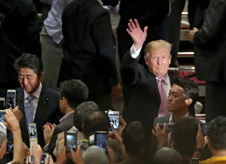 U.S. President Donald Trump and Japanese Prime Minister Shinzo Abe attend the Summer Grand Sumo Tournament at Ryogoku Kokigikan Sumo Hall in Tokyo, Japan May 26, 2019. REUTERS/Jonathan Ernst