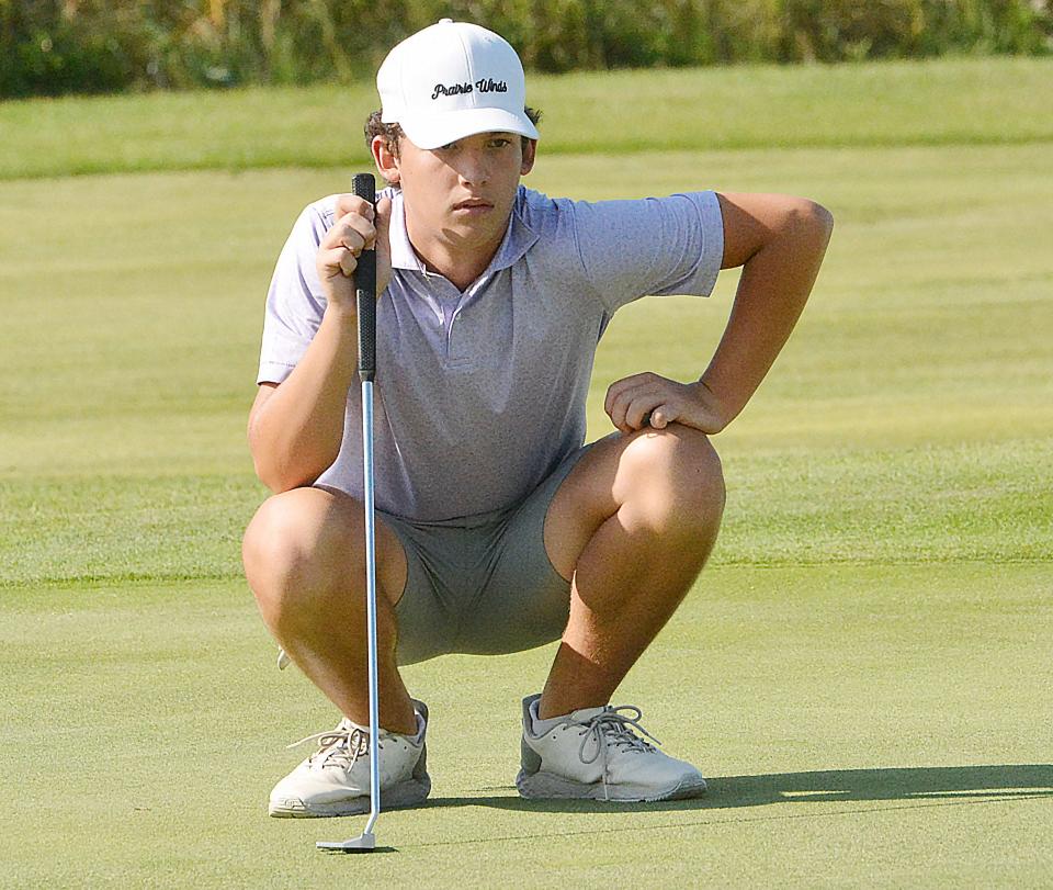 Watertown's Jaden Solheim studies a putt on No. 2 Red during the Watertown Boys Golf Invite on Tuesday, Sept. 19, 2023 at Cattail Crossing Golf Course.