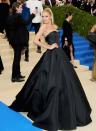 The Victoria’s Secret model may have only given birth in October but she looked incredible on the red carpet in this black Topshop ballgown.