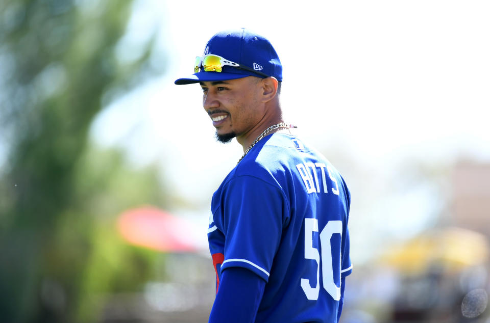 GLENDALE, ARIZONA - FEBRUARY 26: Mookie Betts #50 of the Los Angeles Dodgers prepares for a spring training game against the Los Angeles Angels at Camelback Ranch on February 26, 2020 in Glendale, Arizona. (Photo by Norm Hall/Getty Images)