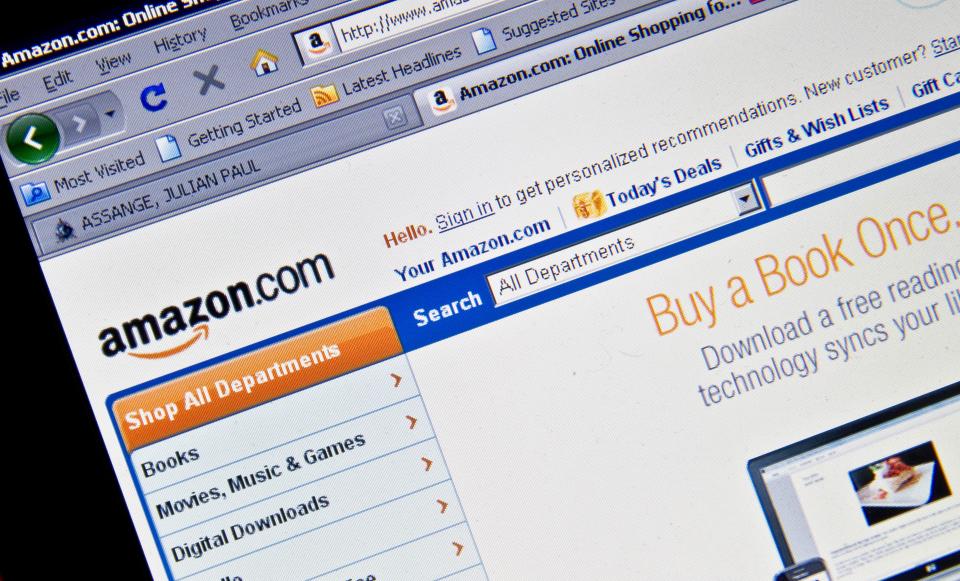 View of the Amazon homepage taken in Washington on December 3, 2010. WikiLeaks, battling to remain online after sparking an international furor with its release of secret US cables, accused Amazon of cowardice for booting the website off its servers.  The Seattle-based Amazon, meanwhile, broke days of silence and provided its first public explanation of its decision to withdraw its Web-hosting services from WikiLeaks.org. Amazon Web Services, in a statement, said it cut off WikiLeaks because it had violated the company's terms of service and not because of any government pressure.     AFP PHOTO/Nicholas KAMM (Photo credit should read NICHOLAS KAMM/AFP/Getty Images)