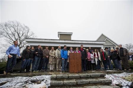 Relatives of the victims killed in the Sandy Hook Elementary School tragedy in Newtown, Connecticut give a statement regarding the formation of the website mysandyhookfamily.org just before the one year anniversary of the disaster in Sandy Hook, Connecticut December 9, 2013. REUTERS/Lucas Jackson