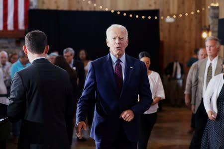 2020 Democratic U.S. presidential candidate and former Vice President Joe Biden walks during a campaign stop in Burlington