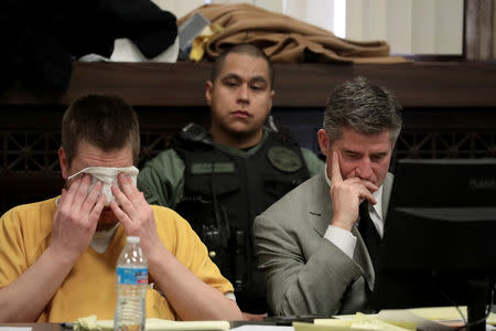 Former Chicago police Officer Jason Van Dyke reacts as he listens during his sentencing hearing with his attorney Daniel Herbert at the Leighton Criminal Court Building in Chicago, Illinois, U.S., January 18, 2019. Antonio Perez/Chicago Tribune/Pool via REUTERS