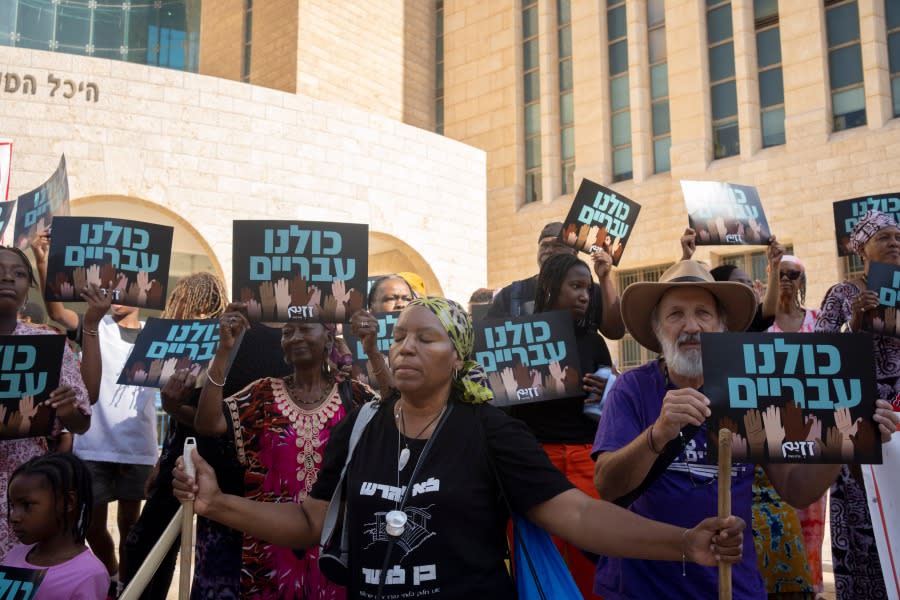 Estella Rivers, a member of the Hebrew Israelite community, pauses during a rally outside of the District Court in Beersheba, Israel, ahead of a hearing on the deportation orders for her and dozens of others from her community, Wednesday, July 19, 2023. Over the decades, the community has made inroads into Israeli society, and most of them have citizenship or residency rights. But 130 members remain undocumented, and Israeli authorities have ordered them to leave. The orders have left dozens of people, some of whom have lived most of their lives in Israel, in an uncertain legal limbo. (AP Photo/Maya Alleruzzo)