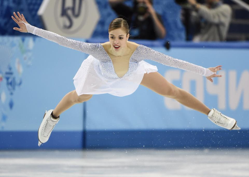 Carolina Kostner of Italy competes in the women's team short program figure skating competition at the Iceberg Skating Palace during the 2014 Winter Olympics, Saturday, Feb. 8, 2014, in Sochi, Russia. (AP Photo/The Canadian Press, Paul Chiasson)