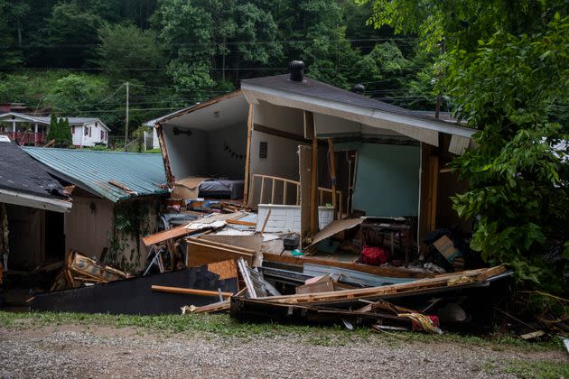 A home along KY-28 was moved off its foundation by the floodwaters in Chavies, Kentucky, on July 29, 2022. (Photo: Arden S. Barnes/For The Washington Post/Getty Images)