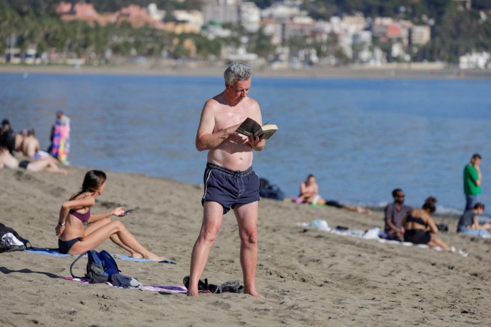 Tourists were treated to unusually warn weather in Malaga on Tuesday (REUTERS/Jon Nazca)