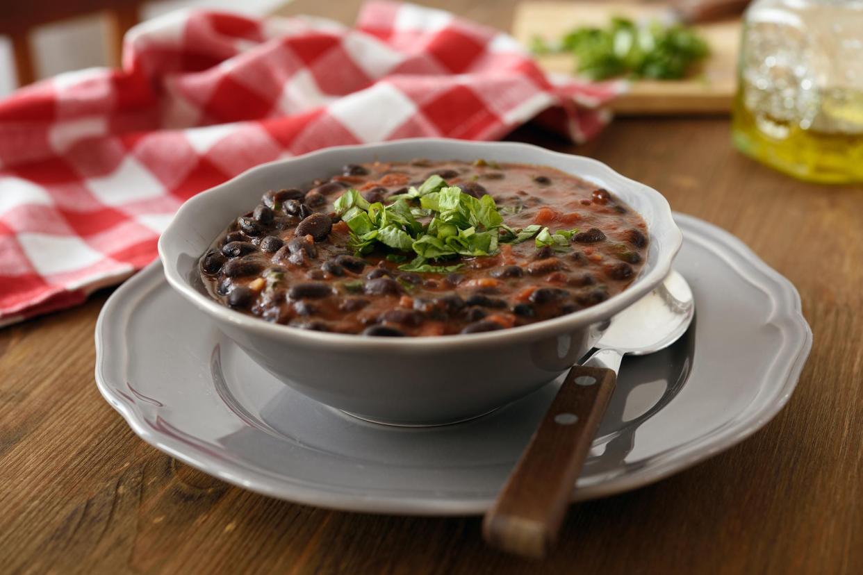 Black bean soup in a white bowl