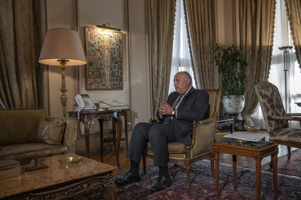 Egyptian Foreign Minister Sameh Shukry listens during an interview with The Associated Press at his office, in Cairo, Egypt, Sunday, June 21, 2020. Egypt wants the United Nations Security Council to "undertake its responsibilities" and prevent Ethiopia from starting to fill its massive, newly built hydroelectric dam on the Nile River next month amid a breakdown in negotiations, Shukry told the AP on Sunday, accusing Ethiopian officials of stoking antagonism between the countries. (AP Photo/Nariman El-Mofty)