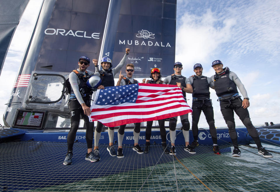 In this image provided by SailGP, USA SailGP Team celebrate winning the Spain Sail Grand Prix onboard the USA SailGP Team F50 catamaran on Race Day 2 of the Spain Sail Grand Prix in Cadiz, Spain., Sunday, Oct 15 2023. (Ricardo Pinto/SailGP via AP)