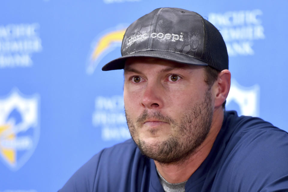 Los Angeles Chargers quarterback Philip Rivers reacts at a news conference following an NFL football game against the Kansas City Chiefs in Kansas City, Mo., Sunday, Dec. 29, 2019. (AP Photo/Ed Zurga)