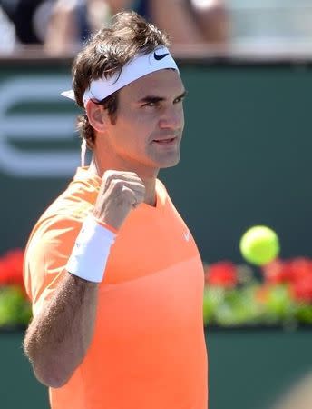 Mar 20, 2015; Indian Wells, CA, USA; Roger Federer (SUI) reacts to the winning point of his quarter final match against Tomas Berdych (CZE) at Indian Wells Tennis Garden. Federer won 6-4, 6-0. Mandatory Credit: Jayne Kamin-Oncea-USA TODAY