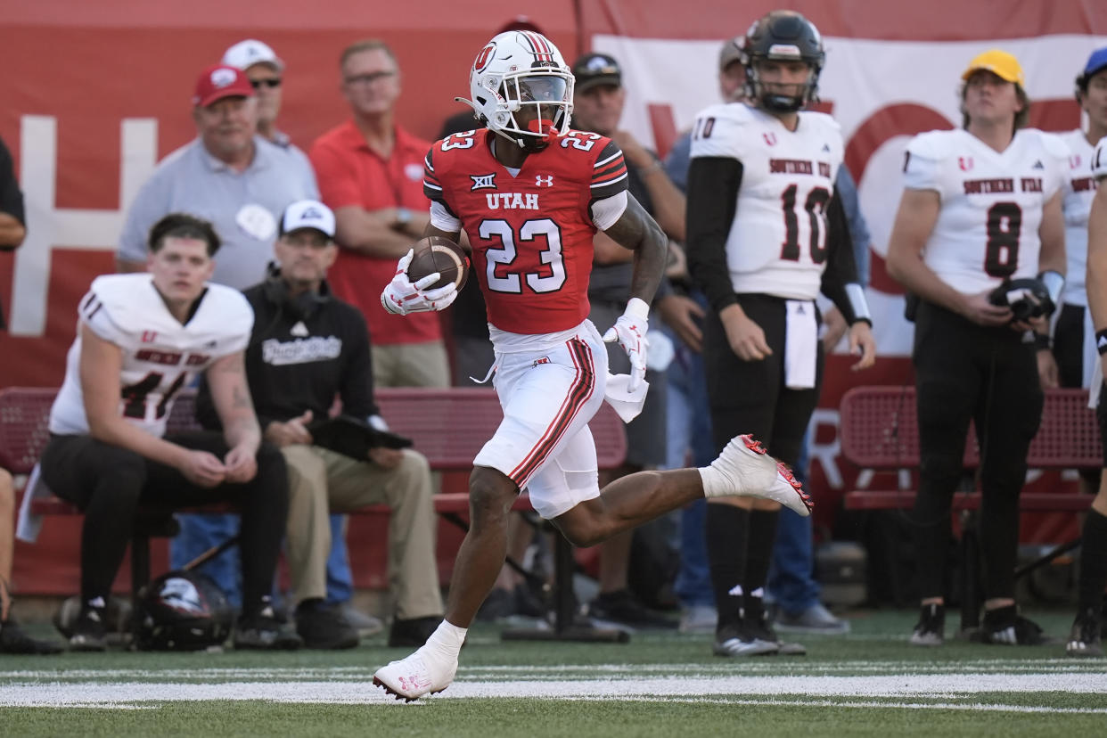 Utah running back Dijon Stanley (23) carries the ball for a touchdown in the first half of an NCAA college football game against Southern Utah Thursday, Aug. 29, 2024, in Salt Lake City. (AP Photo/Rick Bowmer)