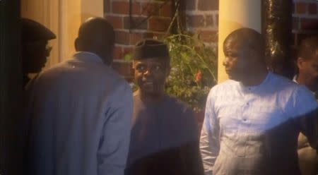 Nigerian Vice-President Yemi Osinbajo leaves Abuja House, the Nigerian High Commission in London, Britain, after meeting Nigerian President Muhammadu Buhari, in this still image from a video taken July 11, 2017. via Reuters TV