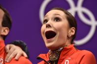 <p>Germany’s Annika Hocke (pictured) and Germany’s Ruben Blommaert react after competing in the pair skating short program of the figure skating event during the Pyeongchang 2018 Winter Olympic Games at the Gangneung Ice Arena in Gangneung on February 14, 2018. / AFP PHOTO / ARIS MESSINIS </p>