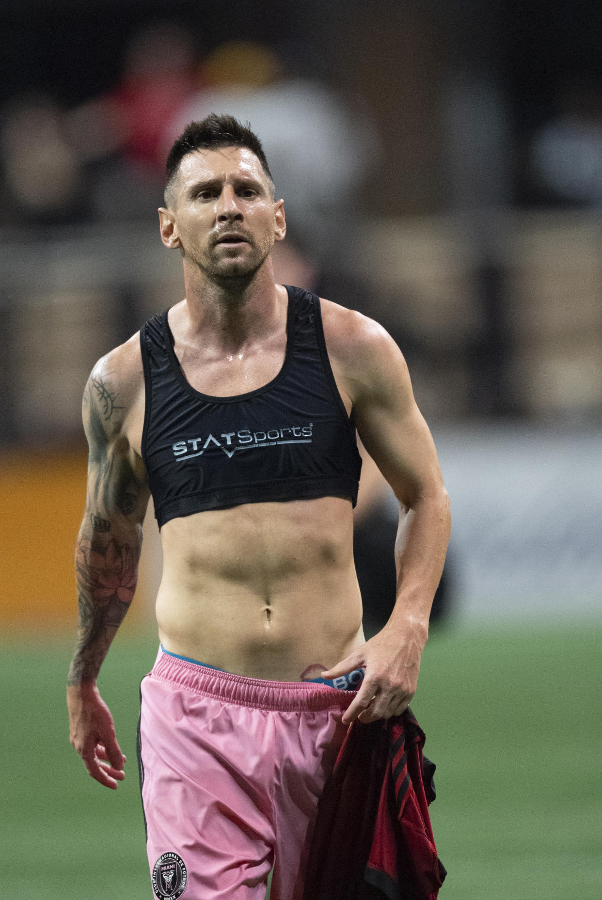 Inter Miami forward Lionel Messi leaves the pitch after during a MLS soccer match against Atlanta United Wednesday, Sept. 18, 2024. (AP Photo/John Bazemore)