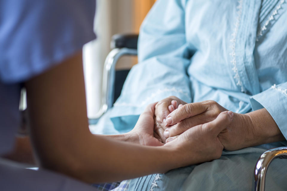 Elderly woman on a wheelchair. 