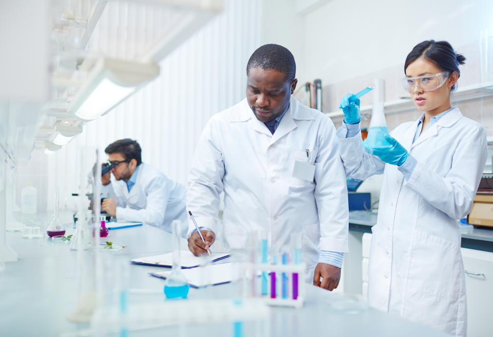 Three scientists in a lab