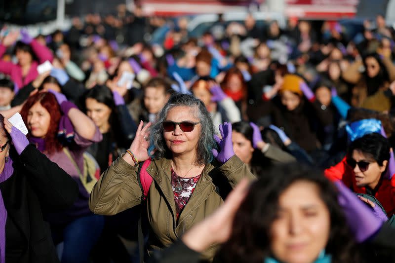 Women perform the Chilean anti-rape song during a demonstration against gender violence in Istanbul,