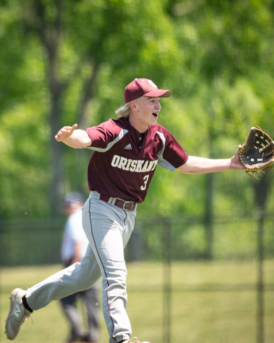 Oriskany pitcher Eddie Wright smiles Monday after striking out the final Belleville-Henderson batter to win the Section III Class D baseball tournament's championship game at Onondaga Community College.