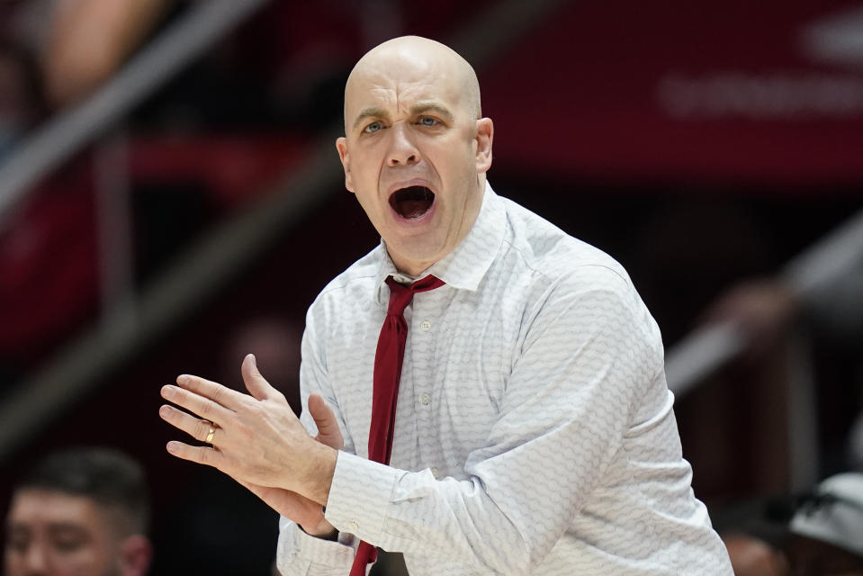 Utah head coach Craig Smith shouts to his team in the first half during an NCAA college basketball game against UCLA Thursday, Jan. 20, 2022, in Salt Lake City. (AP Photo/Rick Bowmer)