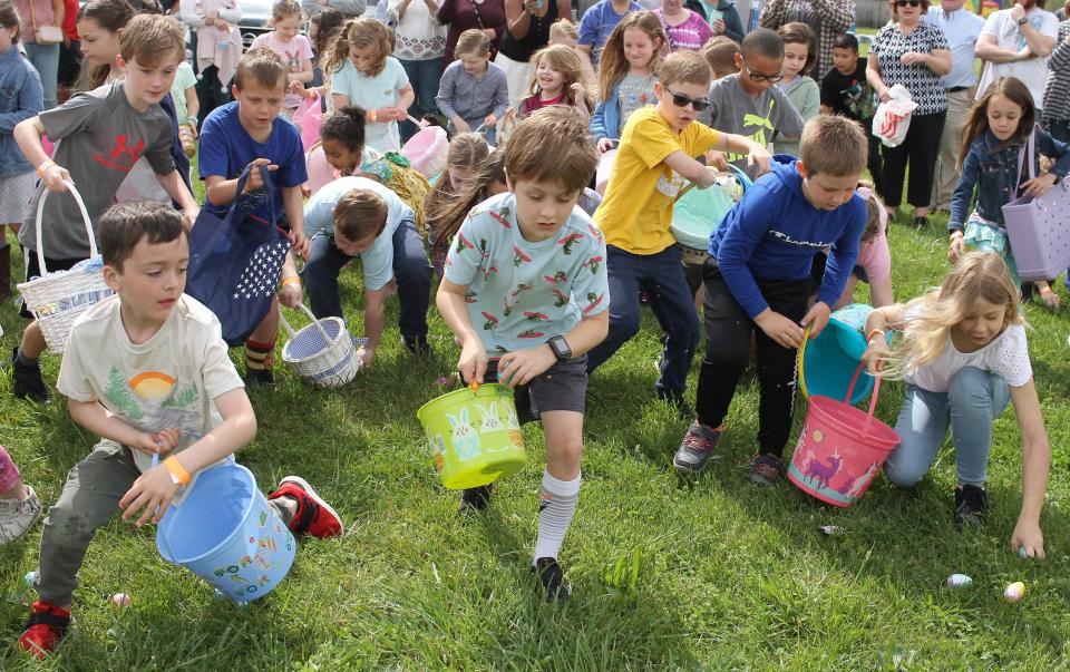 The mad dash for eggs is on at the First Baptist Egg Hunt in Hendersonville, Tenn., on Saturday, April 16, 2022. 