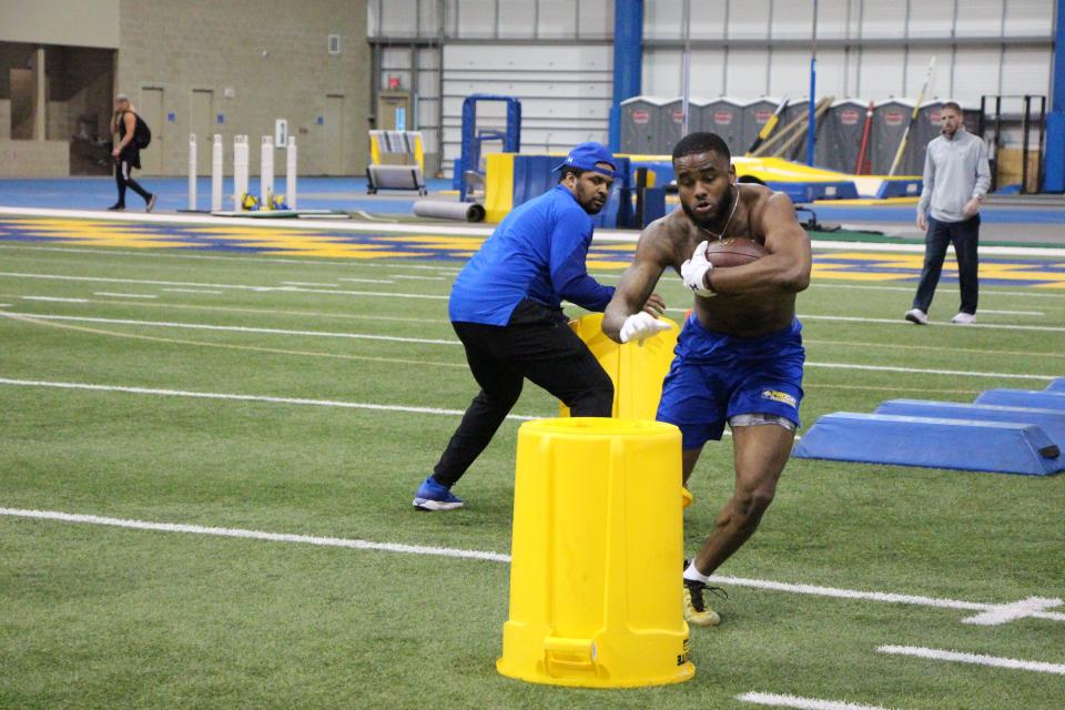 Pierre Strong runs through a drill at the South Dakota State football Pro Day on Wednesday at the SJAC in Brookings.