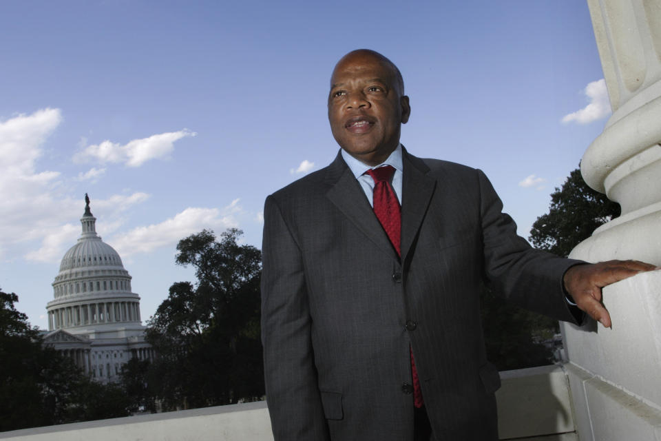 FILE - In this Oct. 10, 2007, file photo, with the Capitol Dome in the background, U.S. Rep. John Lewis, D-Ga., poses on Capitol Hill in Washington. Lewis, who carried the struggle against racial discrimination from Southern battlegrounds of the 1960s to the halls of Congress, died Friday, July 17, 2020. (AP Photo/Lawrence Jackson, File)