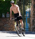 <p>Josh Dallas goes shirtless on Monday for a bike ride in Los Angeles. </p>