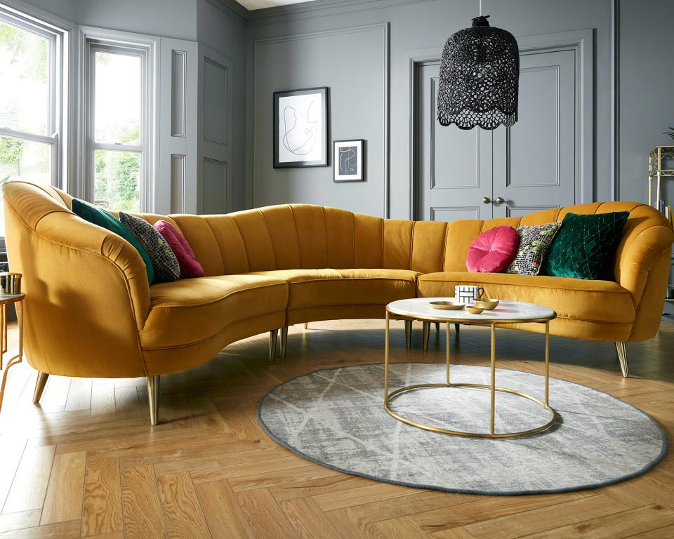 2. Or choose a statement yellow sofa