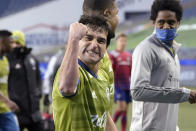 Seattle Sounders' Nicolas Lodeiro pumps his fist as he heads off the field after the team's 1-0 win over FC Dallas in an MLS playoff soccer match Tuesday, Dec. 1, 2020, in Seattle. (AP Photo/Ted S. Warren)