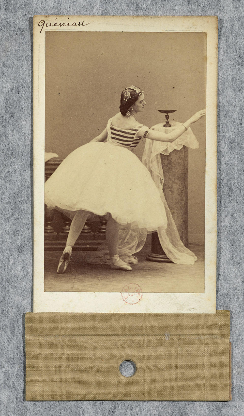 CORRECTS YEAR TO 1866, NOT 1966-This undated photo taken by Disderi and provided by the BNF (Bibilotheque Nationale de France) shows opera dancer Constance Queniaux. She was a courtesan living from subsidies provided by rich men - but preferring the company of women - and ended her life as a very honorable patroness helping orphans. Mademoiselle Constance Queniaux was 34 in 1866 when the French master Gustave Courbet painted her in L’Origine du monde (The Origin of the World), a realistic close up of a woman's naked torso, legs spread and face hidden by a rumpled sheet. French literature expert Claude Schopp found by chance the mention of her name in a letter by French writer Alexandre Dumas fils, the son of The Three Musketeers’ author. (Disderi/BNF via AP)