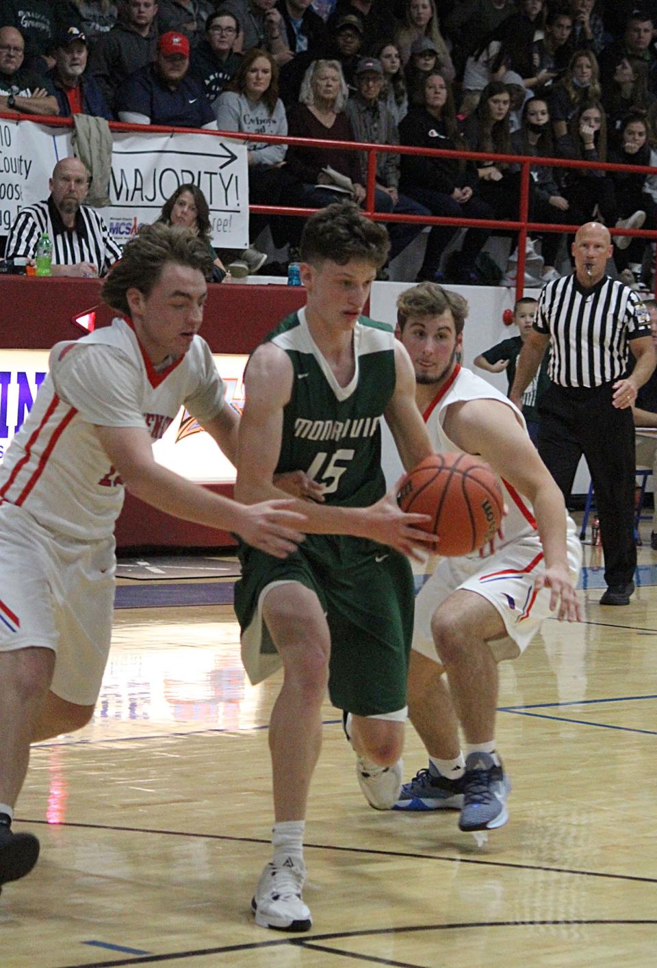 Monrovia senior Trent Hale goes towards the basket during Wednesday's Powder Keg game at Eminence.