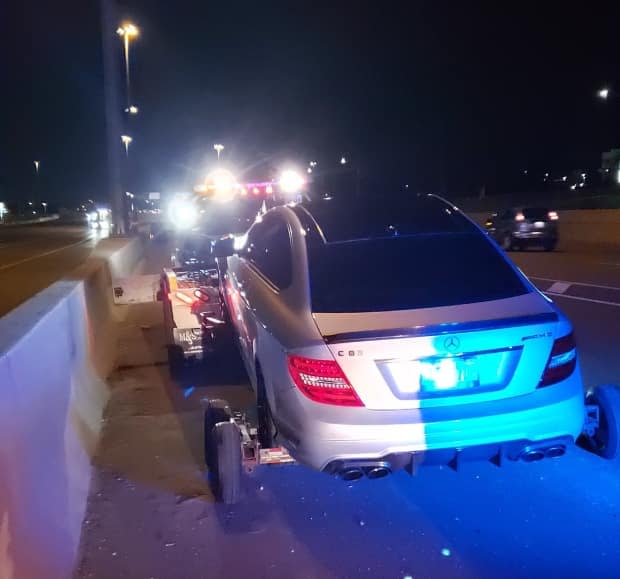 An 18-year-old was charged with stunt driving after the OPP say he was clocked driving 308 km/h on the QEW in May, 2020.  (OPP_HSD/Twitter - image credit)