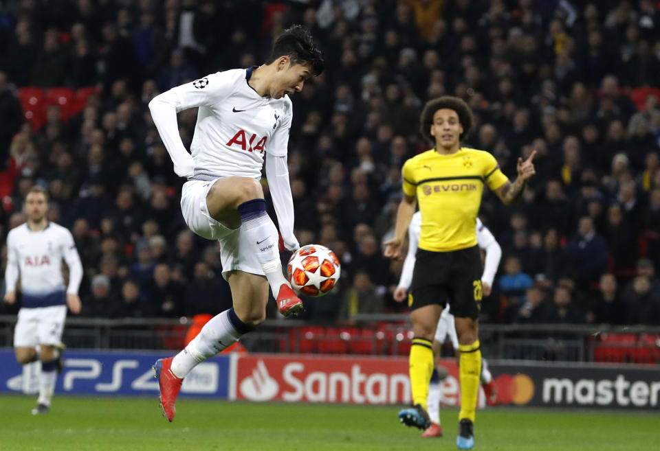 Tottenham midfielder Son Heung-min scores the opening goal during the Champions League round of 16, first leg, soccer match between Tottenham Hotspur and Borussia Dortmund at Wembley stadium in London, Wednesday, Feb. 13, 2019. (AP Photo/Alastair Grant)