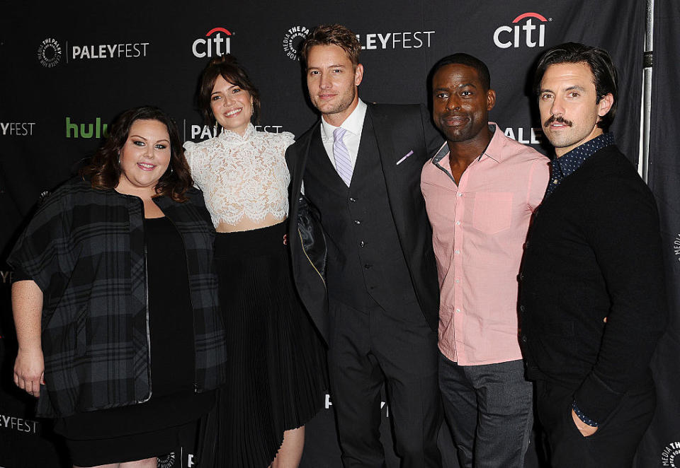 the cast at a season premiere