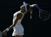 Eugenie Bouchard of Canada serves during her match against Ying-Ying Duan of China at the Wimbledon Tennis Championships in London, June 30, 2015. REUTERS/Toby Melville