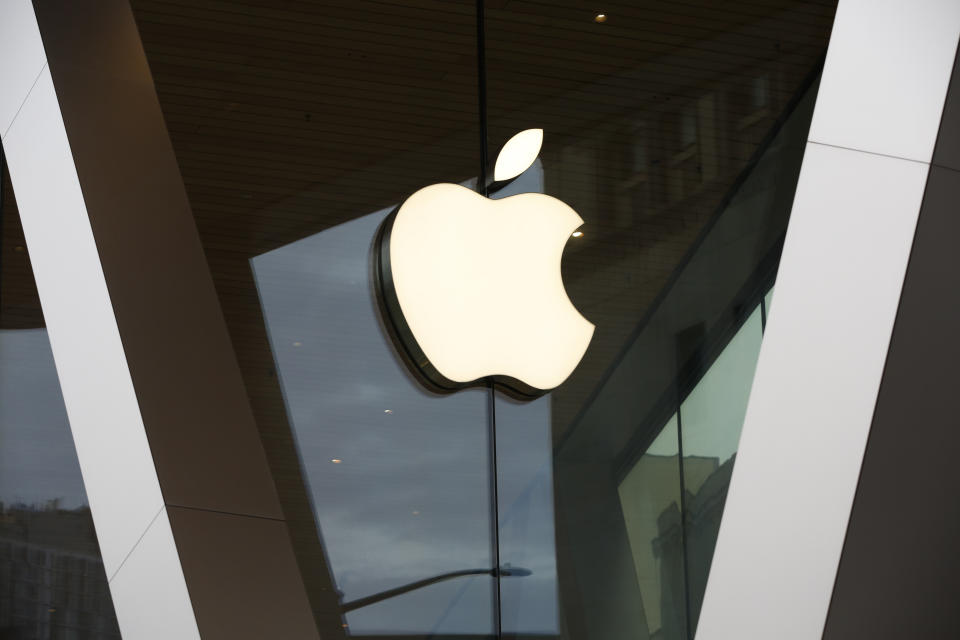 FILE - The Apple logo adorns the facade of the downtown Brooklyn Apple store in New York, March 14, 2020. With U.S. union ranks swelling as everyone from coffee shop baristas to warehouse workers seeks to organize, Illinois voters will decide in November 2022 whether to amend their state constitution to guarantee the right to bargain collectively. (AP Photo/Kathy Willens, File)