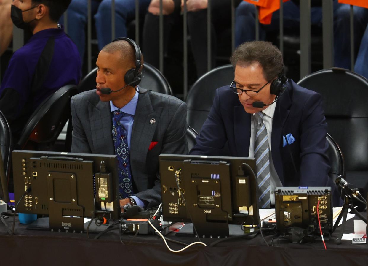 Television analysts Kevin Harlan, right, and Reggie Miller call an NBA game for TNT in 2022.