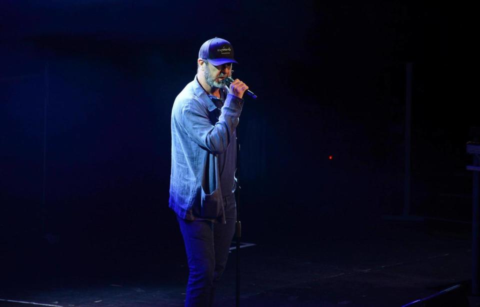 Eric Cantona reads a poem at Hoping For Palestine's event at the Roundhouse in London (Dave Bennett)