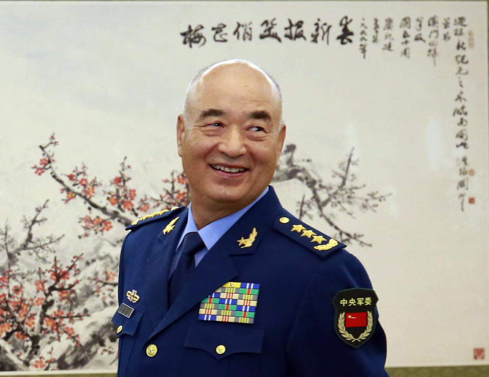 FILE - In this Oct. 22. 2018, file photo, China's Vice Chairmen of the Central Military Commission (CMC) Xu Qiliang waits for German Defense Minister Ursula von der Leyen before their meeting at the Ba Yi Building in Beijing. Xu has emphasized the need for a “strong and modernized maritime law enforcement force” that has been a major participant in asserting Beijing’s claims in the South China Sea. (How Hwee Young/Pool Photo via AP, File)