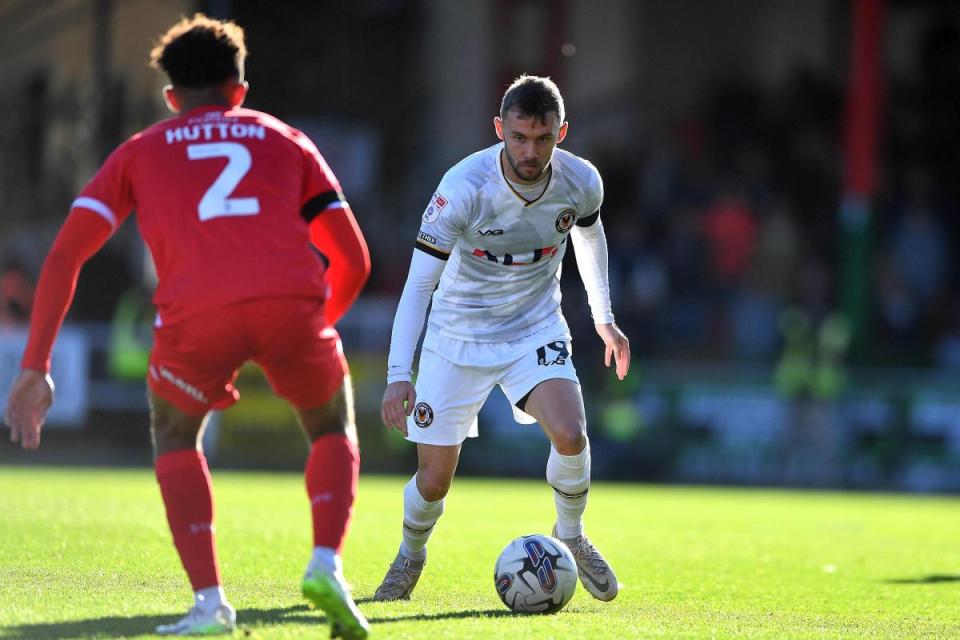 CHANGE: Shane McLoughlin and Newport County will kick off earlier than planned at Swindon <i>(Image: Huw Evans Agency)</i>