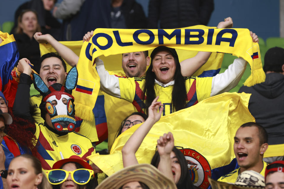 Fans cheer before the Women's World Cup round of 16 soccer match between Jamaica and Colombia in Melbourne, Australia, Tuesday, Aug. 8, 2023. (AP Photo/Hamish Blair)