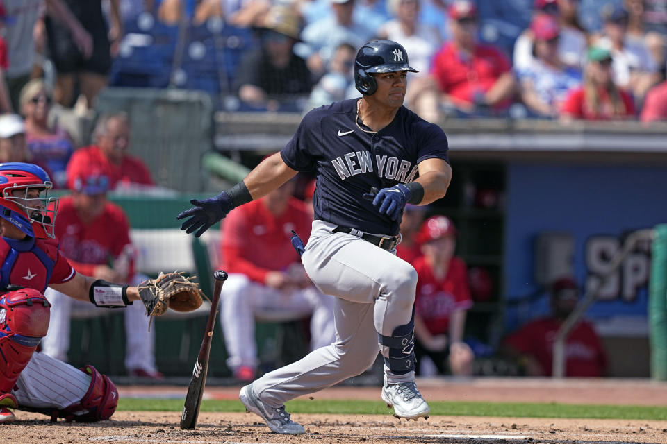 FILE - New York Yankees' Jasson Domínguez grounds out during the second inning of the team's spring training baseball game against the Philadelphia Phillies on Feb. 25, 2023, in Clearwater, Fla. Yankees owner Hal Steinbrenner said he's excited to see what an influx of young players will bring to the major league team over the final weeks of a lost season. The Yankees plan to call up top prospects Domínguez and Austin Wells on Friday, Sept. 1, when active major league rosters expand from 26 to 28. (AP Photo/David J. Phillip, File)