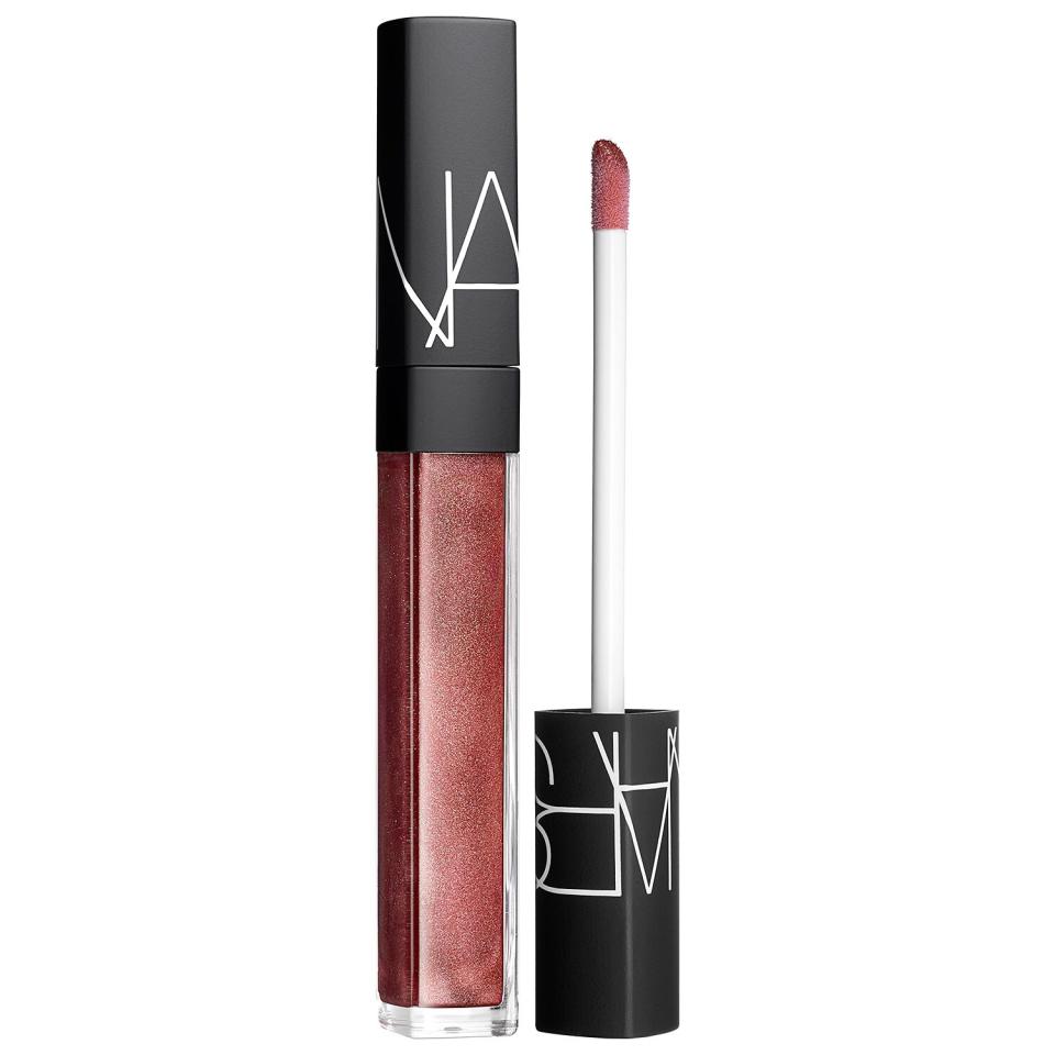 A warm raspberry lip gloss with superior shine and finish. 