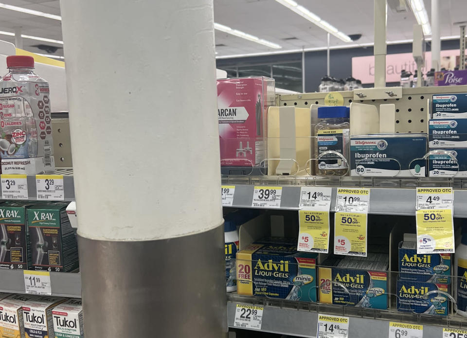 Barrier to access: Narcan in an Atlanta Walgreens was behind a large metal pole. (J.J. McCorvey / NBC News)